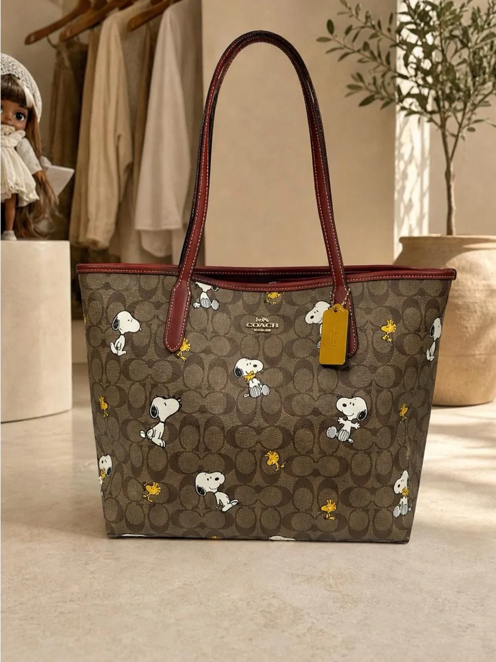 Coach Brown Signature Snoopy Tote with Burgundy Trim and Yellow Tag - Picture 2 of 6